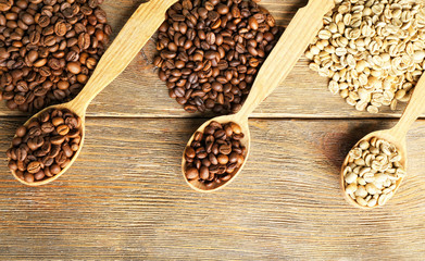 Coffee beans on wooden background