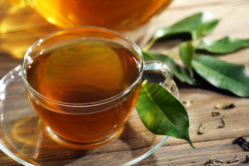 Cup of green tea on table close-up