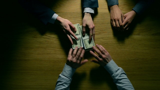 Couple taking money from a money lender