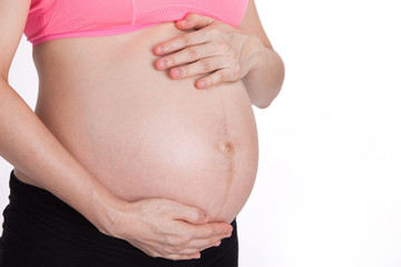 abdomen of pregnant with white background