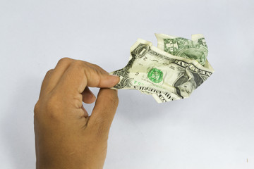 very wrinkled dollars in hand
