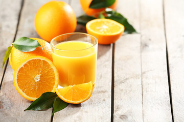 Naklejka na ściany i meble Orange juice on table close-up