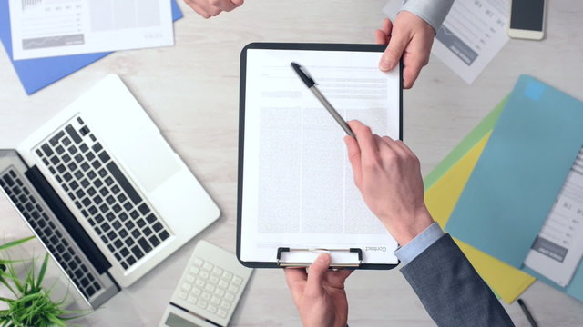 Businessman signing a contract