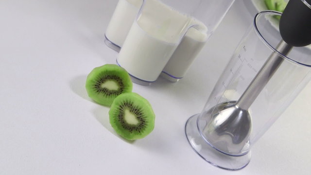 Stick hand blender for making milk kiwi smoothie drink