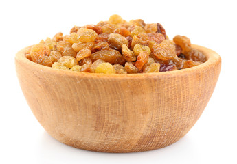 Raisins in bowl isolated on white