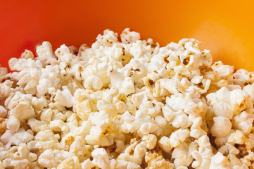 popcorn in bright plastic bowl