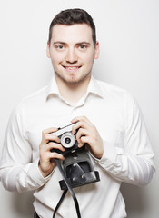 young  photographer over white background