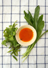 Chili vinegar in a small bowl