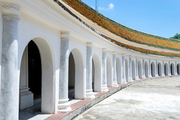 Obraz premium Long corridor around the First Grand Pagoda, Thailand