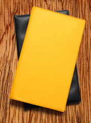 Yellow blank book on white