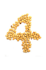 Number four made by sweets beans with colored sugar coat