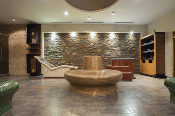 Modern spa interior with hot stone benches