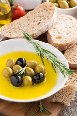 fresh olive oil and Italian snacks, vertical
