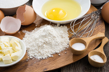 prepared baking ingredients on a wooden board