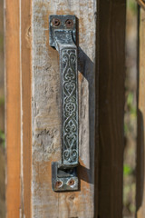 Door handle in old fence.