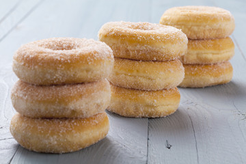 Fresh donut on blue table
