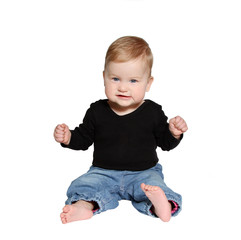 smiling baby sits on white background