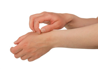 Hands scratching skin