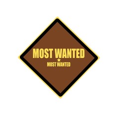Most wanted yellow stamp text on brown background