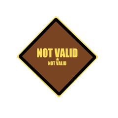 Obraz premium NOT valid yellow stamp text on brown background