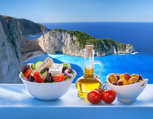  Navagio beach with Greek salad in Zakynthos, Greece
