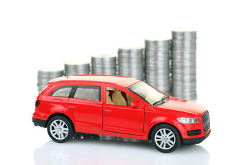 coins and sports red car blur in background isolated 