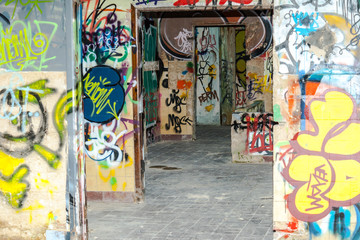 painted graffiti in an abandoned factory building