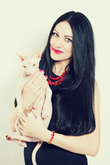 Beautiful Smiling Brunette Girl and her Cat