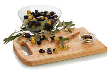 Green black olives and knife