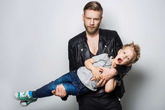 The portrait of a little boy and his father. Fathers day 