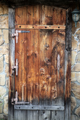 Wooden door in a wall of masonry