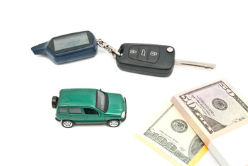 green car, keys and money