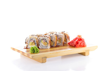 Eel sushi roll on a gete isolated on white background