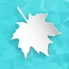 Paper leaf over geometric background