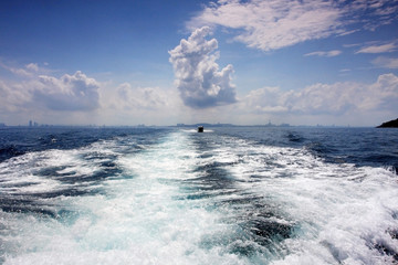 wake of a passenger ship in a clear sky day