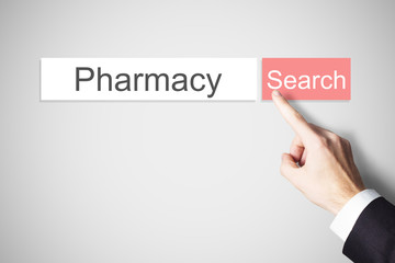 finger pushing websearch button pharmacy