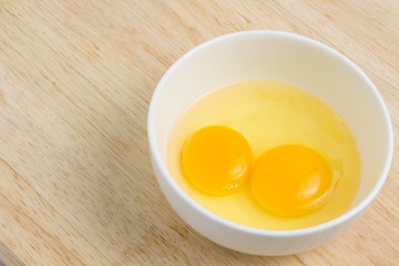 Raw eggs in a bowl, hammering