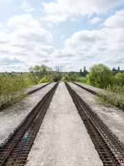 Obraz premium old bridge with rusty metal rails