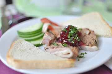pate with toasts on white plate