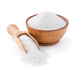Fototapeta na wymiar Regular table salt in a wooden bowl
