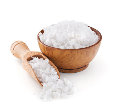 Cyprus sea salt flakes in a wooden bowl