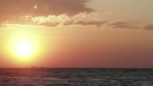 Sea at dawn the sun