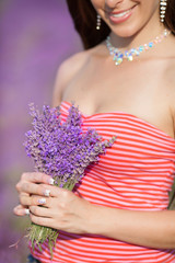 Fototapeta premium beautiful woman lavender flowers girl lavanda field