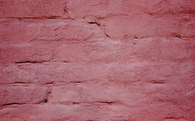background texture of rough brick wall of red color