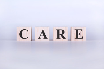 Obraz premium Care Word cube photo