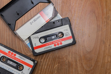 Old tapes on a wooden table