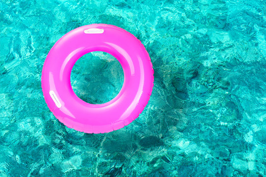 Lifebuoy on water background