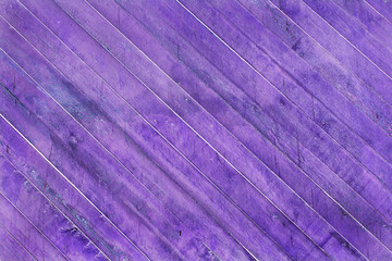 Wooden purple background from natural fibers of different designs