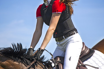 Horsewoman, Clouse-up of Young girl rider and horse - obrazy, fototapety, plakaty