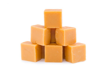 Tasty toffees on a white background.